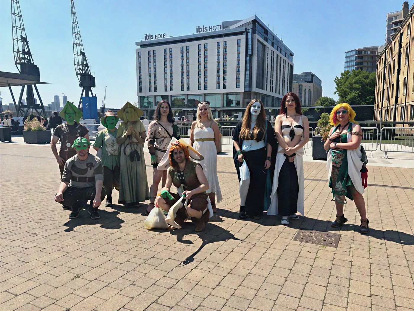 A costumed hobby group meeting up together outdoors.