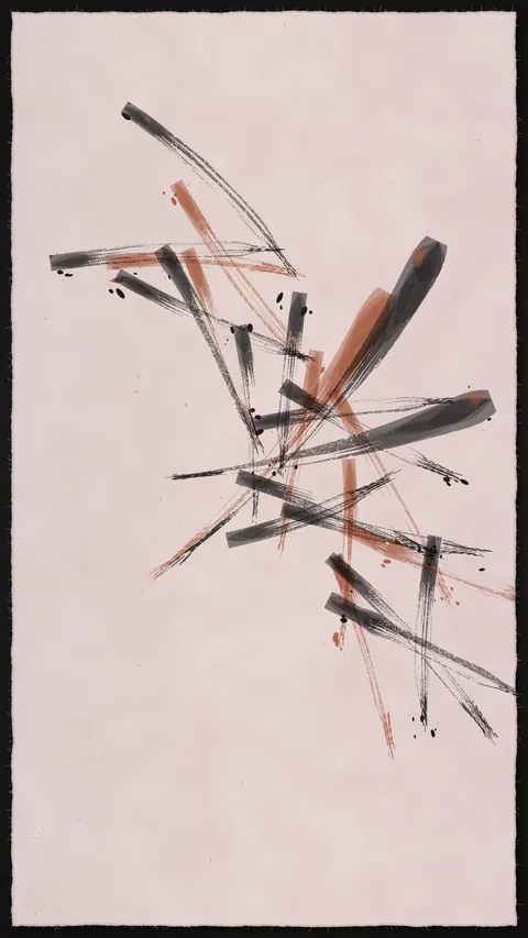 Ink: bold black and rust brushstrokes crossing a pale pink sheet of paper.